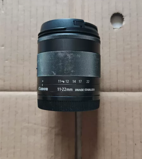 佳能微单11-22镜头,前后盖都有,图片是...