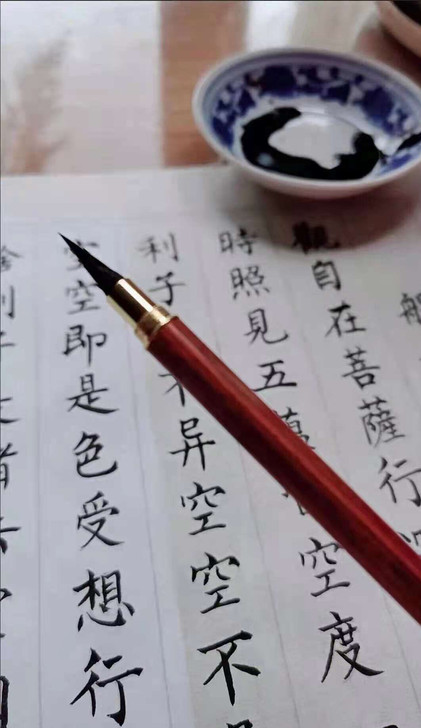 实体店卖98元一套的红黑檀木毛笔，朋友送了...