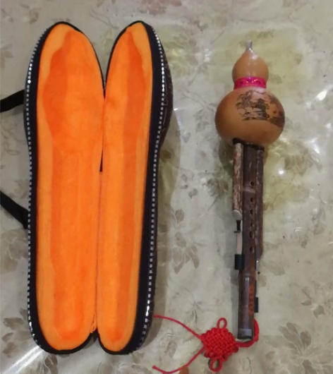 闲置佐同文化葫芦丝,带原装盒个,C调,售出...