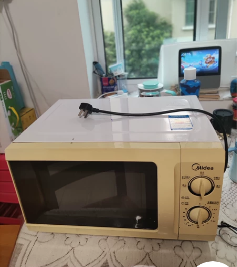 自用美的21升微波炉，功能都是好的，因为搬...