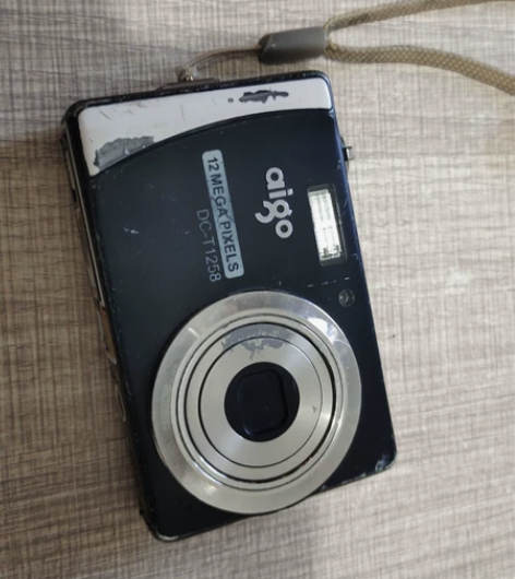 出一台爱国者数码相机，型号是DC-T125...