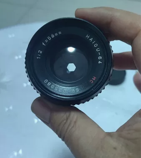 出老单反相机镜头一个，海欧品牌，mD囗，很...