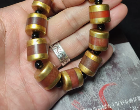 红镐玛瑙手串，鎏金工艺，极少见的高规格古代...