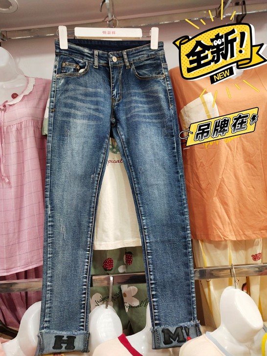 全新牛仔裤女修身弹力小脚裤，蓝色牛仔铅笔裤。