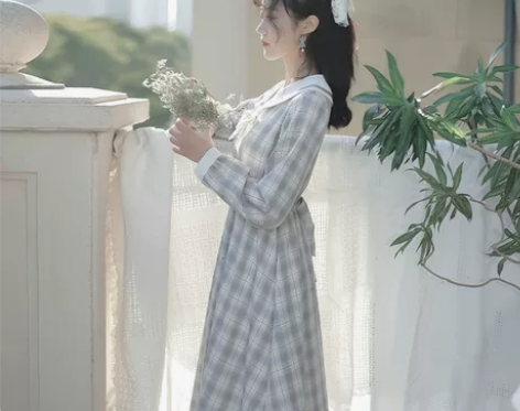蝴蝶结格子连衣裙女2022年早秋新款长袖学...