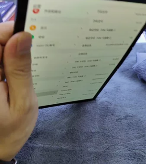 柔宇一代折叠屏手机，全套的带着包装盒和充电...
