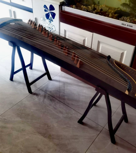 品质演奏考级专业古筝特价转让，只需要换一根...