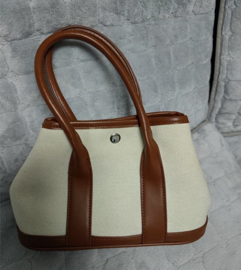 秋冬女小包米白色棕色撞色手提包斜挎包花园包...