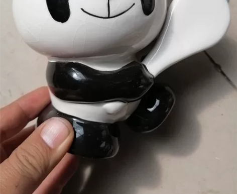 熊猫打网球储蓄罐，底下有点小磕皮！见照片！...