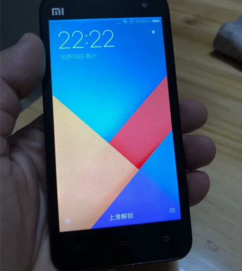 小米手机2之前换了放着，功能完好，充电连上...