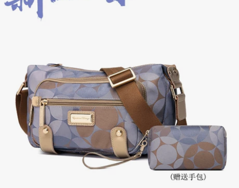 盛装舞步新潮流时尚多隔层斜挎包帆布包中老年...