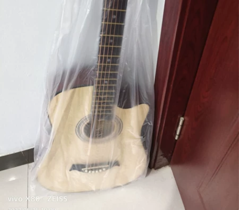 38寸单板民谣吉他全新送吉他包，琴弦，变调...