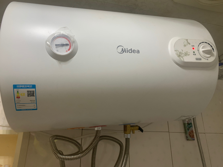 搬家出一台9成新美的热水器，用了一年不到，...