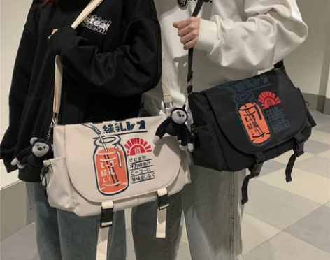 斜挎包ins潮牌日系邮差包男帆布单肩包女休...