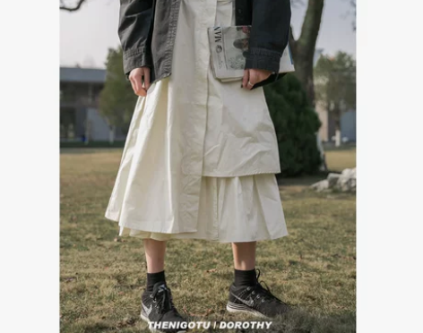 中长款不规则白色半身裙女宽松A字工装高腰褶...