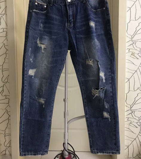 水洗做旧破洞牛仔裤 34码，腰围88，臀围...