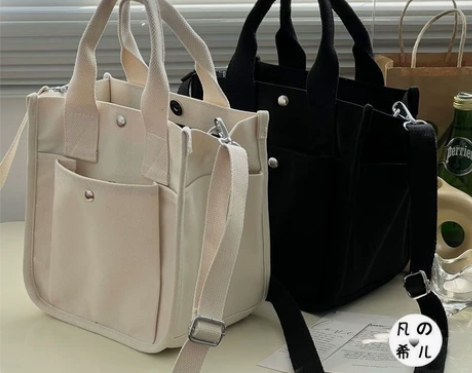 厂家现清仓韩版帆布斜挎包大容量饭盒包妈咪外...