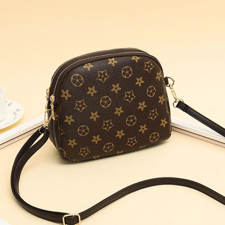 小包包女2021新款大容量百搭多层时尚包