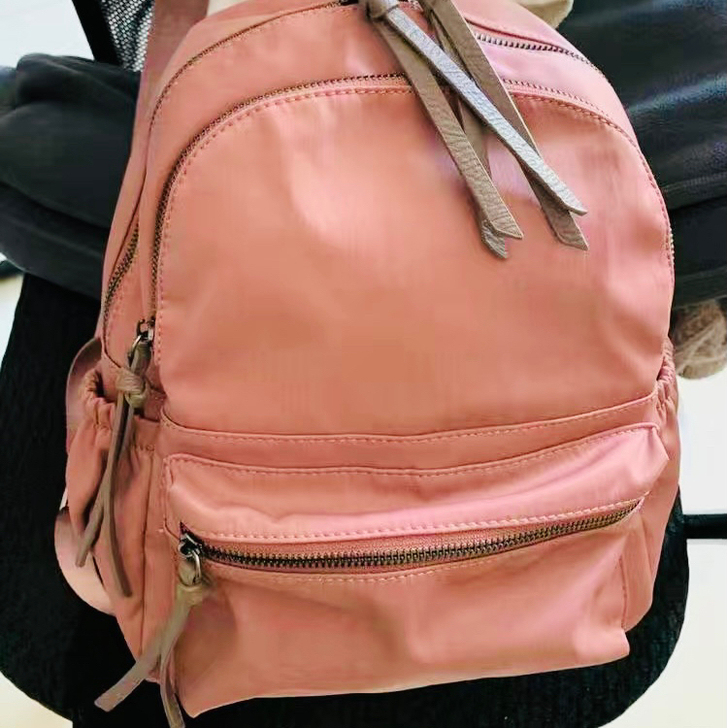 卡帝乐鳄鱼双肩包女新款书包帆布女包包旅行背...