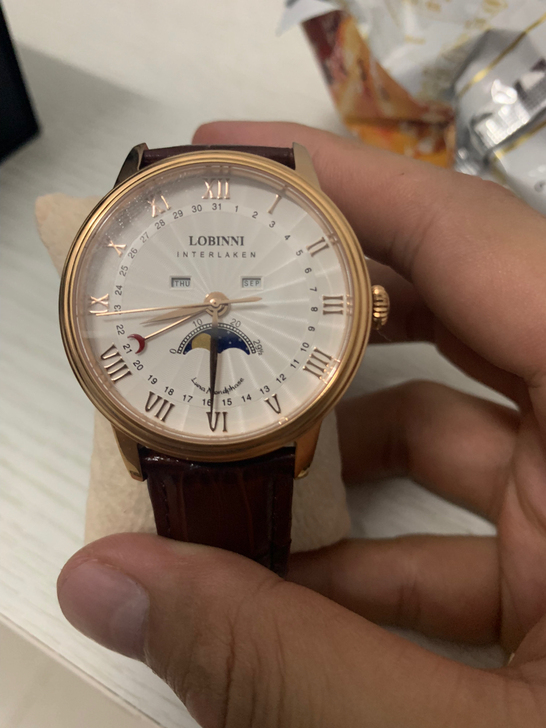 搬家清理，正品原装罗宾尼月相手表，9.5新...