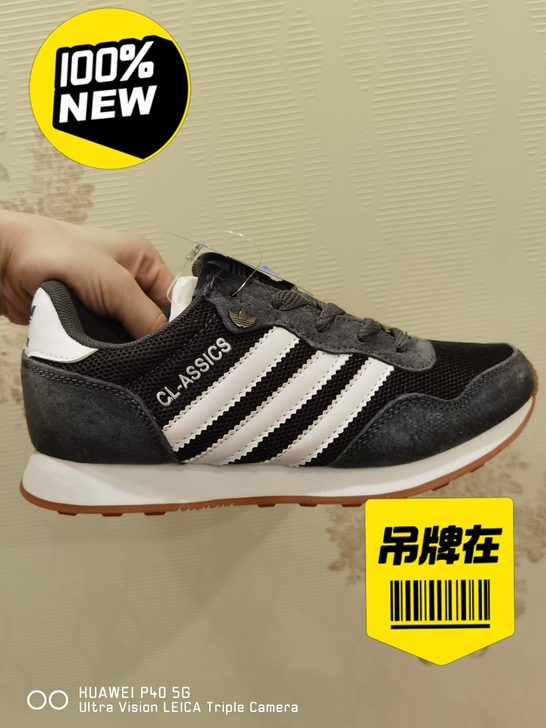 Adidas阿迪达斯浅灰色休闲鞋特价49....