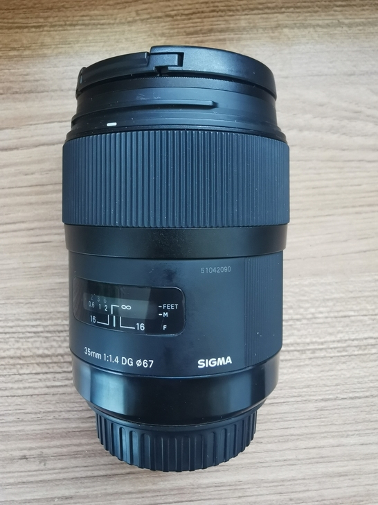 适马35mm 1.4dg镜头佳能口,品相好...