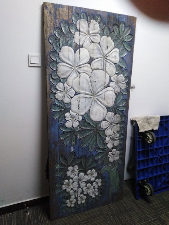 传统民俗装饰画,木板雕刻画,上面刻的什么花...
