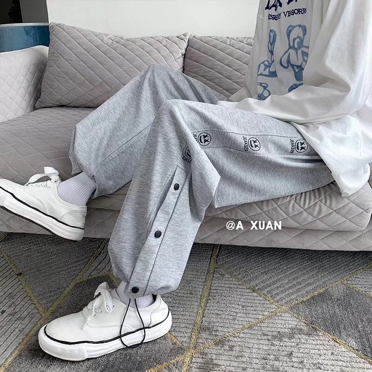 排扣运动裤男春秋季宽松系绳束脚阔腿卫裤潮流...