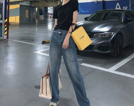 不规则破洞高腰阔腿裤 感兴趣的话点“我想要...