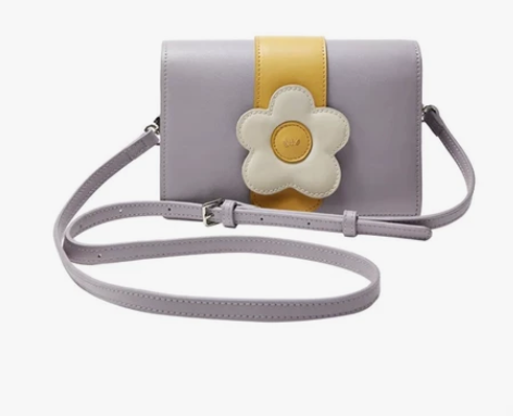 在家——不莱玫紫色花花包 背过两三次，工作...