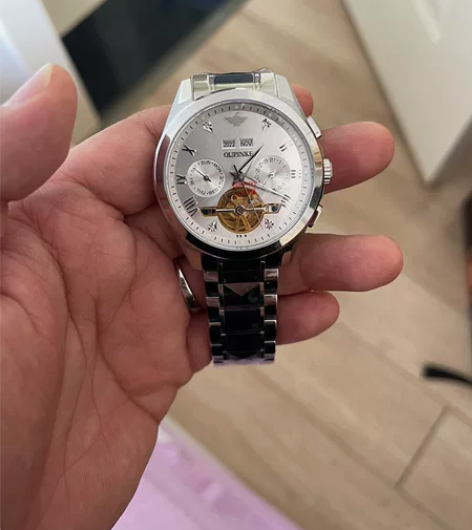 朋友送的国产品牌,欧品客手表。全新未拆封,...