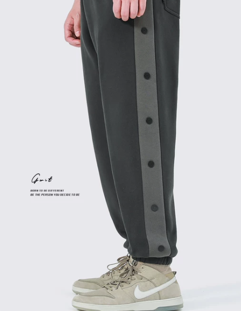 休闲裤子GWIT冬季新款排扣加绒加厚束脚运...