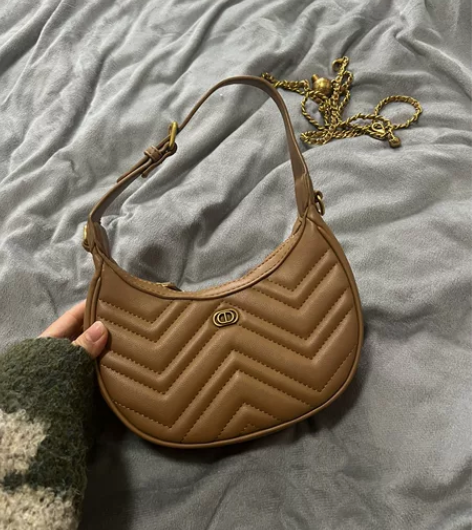 韩版女小包包真皮月牙包单肩斜挎包链条小圆球...