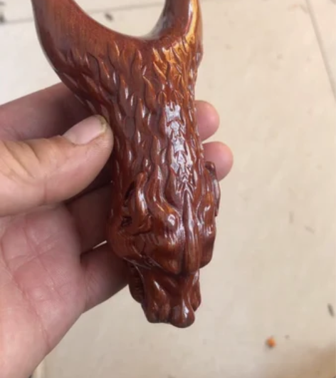 处理一把弹弓沙漠铁雕刻狼头弹弓弓门70长1...