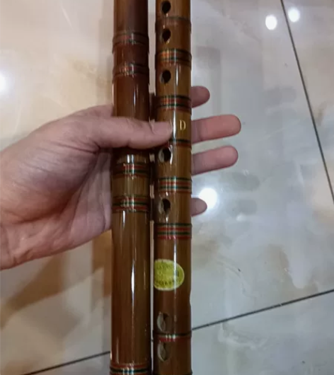 处理D调笛子，有裂已维修，售出不退换 感兴...