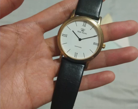 天王皮带手表，表盘挺新的，就是表带有磨损，...
