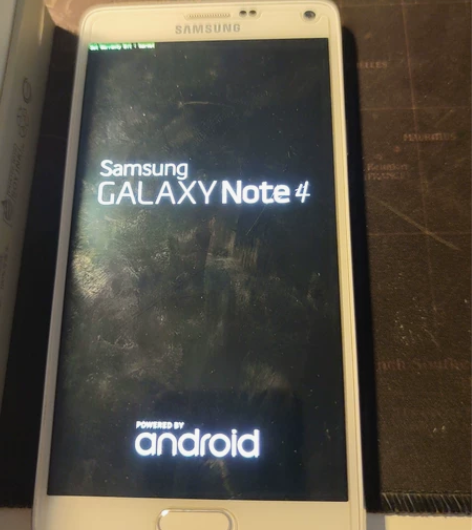 忘了哪年的三星note4，16G存储可扩展...