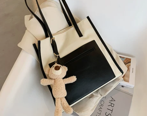 优尚 女士包 熊猫不见了，卖的便宜是因为邮...