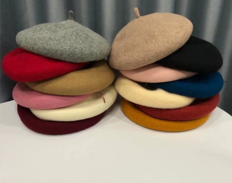 商场里卖一百多的纯羊毛贝雷帽，画家帽， 感...