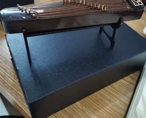 闲置，古筝模型摆件一个。全新，尺寸长16厘...