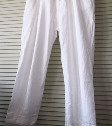 七茉 白色棉麻裤，L码，九新，裤脚前后有设...