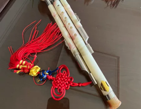 葫芦丝C调,仿桃花很漂亮。原价53,学校让...
