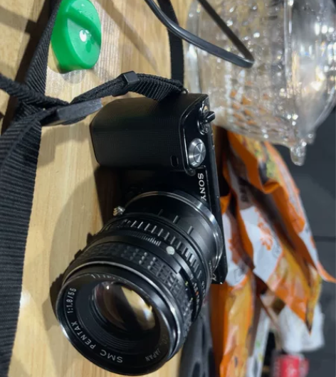 索尼sonynex5c奶昔5c镜头是宾得1...