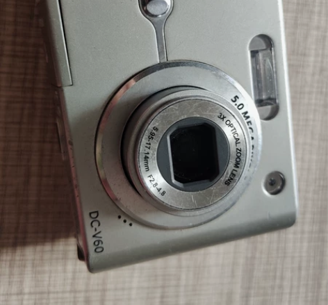 出一台爱国者数码相机，型号是DC-V60，...