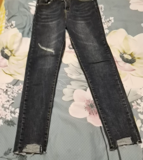全新兰黑色不规则裤边小破洞紧身弹力牛仔裤小...