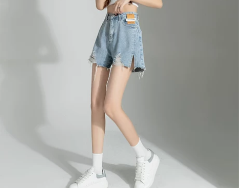 浅色破洞牛仔短裤女夏薄款辣妹高腰显瘦开叉a...