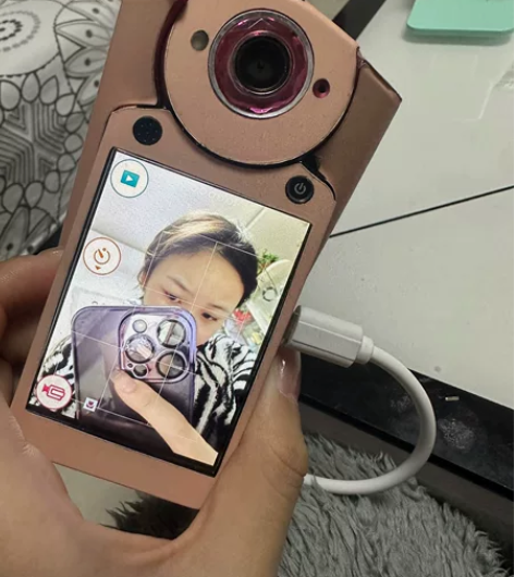 卡西欧相机，tr500 可以把膜撕掉 是粉...