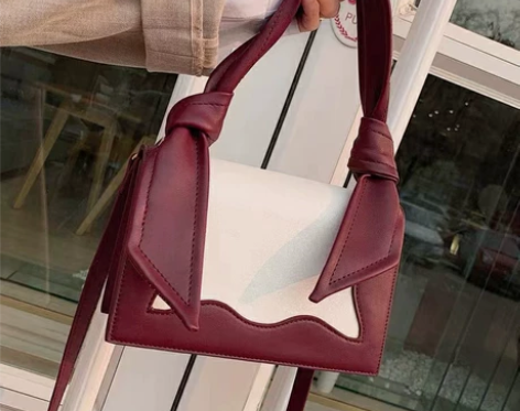 扭结饰女士包波浪兔耳包新款潮韩版时尚百搭手...