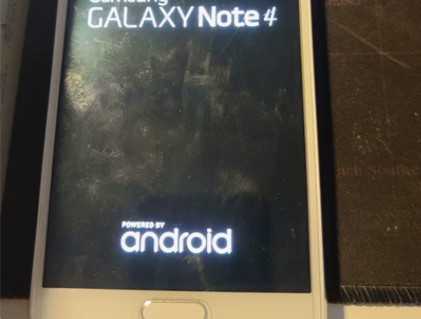 忘了哪年的三星note4，16G存储可扩展...