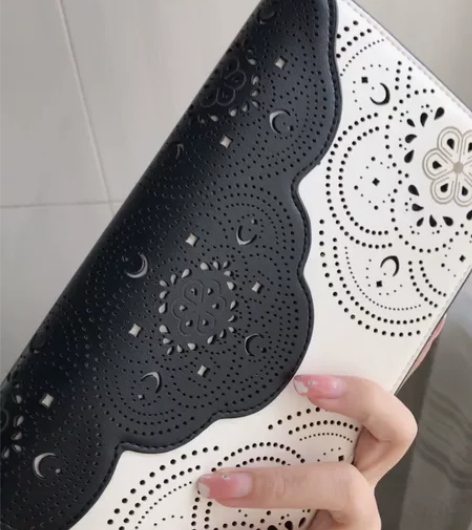 马连奴奥兰迪真皮复古女士拉链镂空气质手拿包...